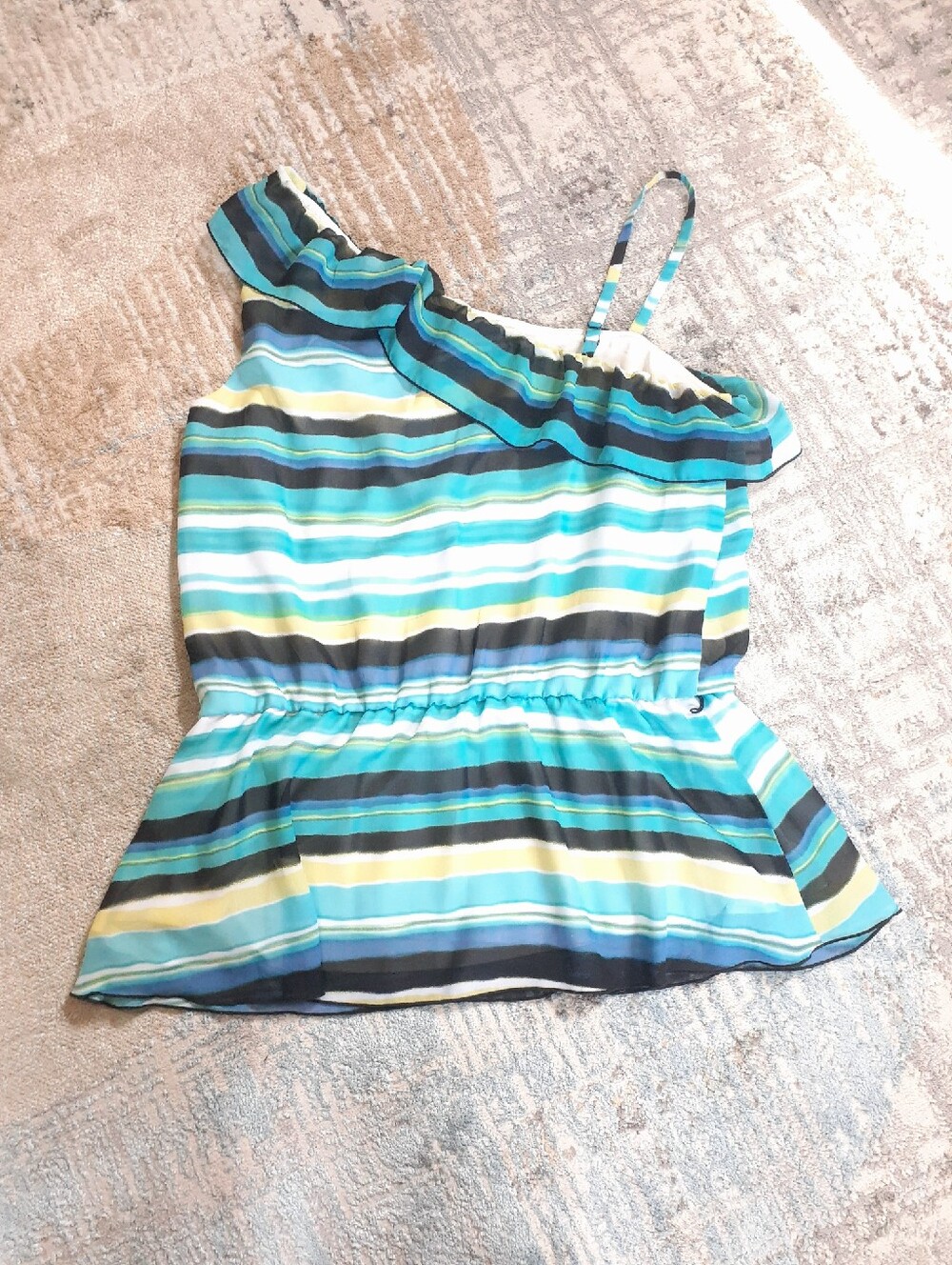B. Wear striped ruffle one shoulder top